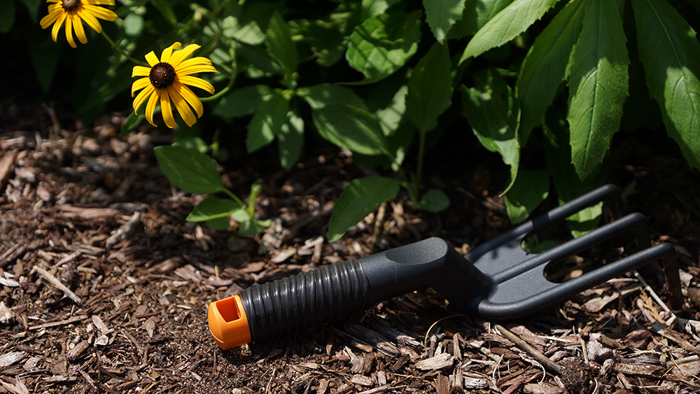 Garden Tool in Mulch Wrapped in Grip